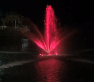 The original fountain at night.