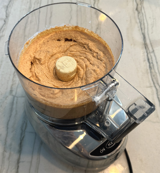 Add 1 packet of taco seasoning OR mix together the homemade taco seasoning mix. Blend everything together until it's smooth, about 1-2 minutes. 