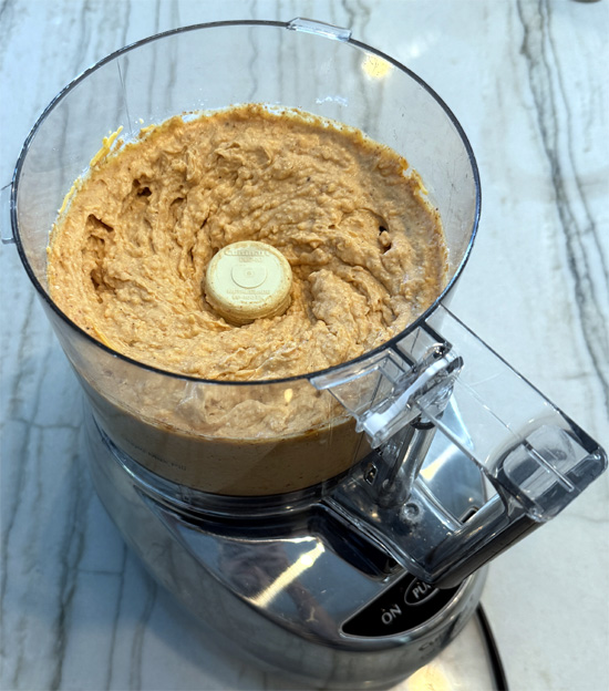 Add the cheese and process just until combined, another minute.