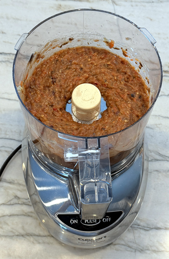 Transfer the vegetables to a food processor. Add the tomato paste and vinegar then pulse until blended. (The mixture should be chunky.)
