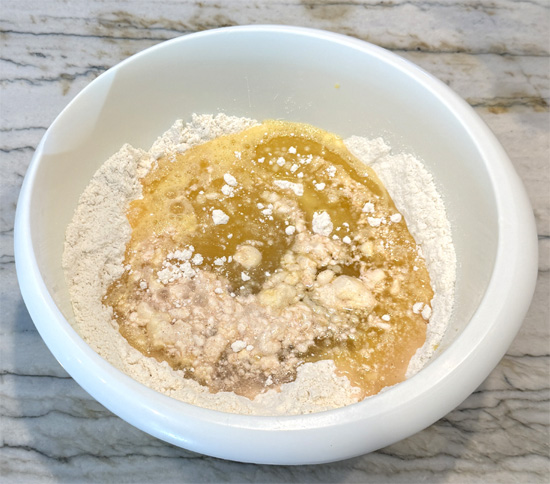 Add the eggs, oil, and water to the dry ingredients. Stir gently until just combined.