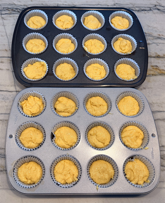Divide the batter among the 24 liners, filling each about half full.