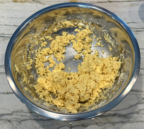 Keep mixing until all the dough is wet, as pictured. 