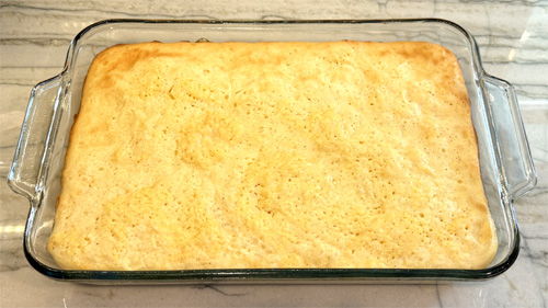 Bake at 325 degrees Fahrenheit for 45 to 55 minutes until the top starts to turn a golden brown. 