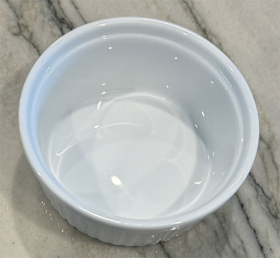 Lightly coat the ramekin with buttery cooking spray.