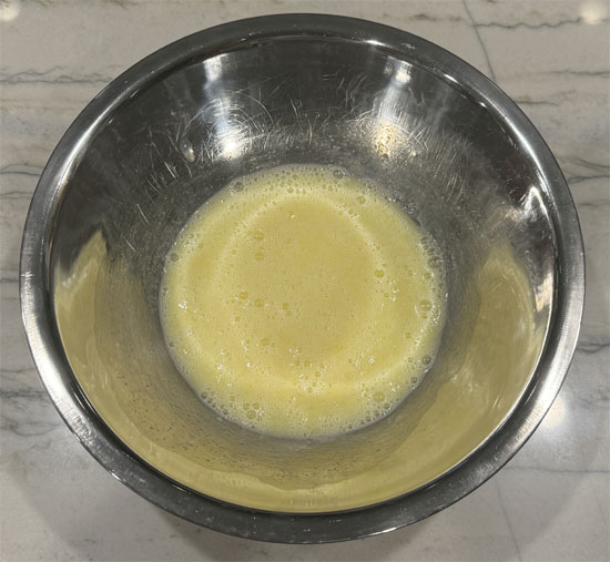 In a separate mixing bowl, whisk together the wet ingredients, vegetable oil, egg whites, whole egg and milk.