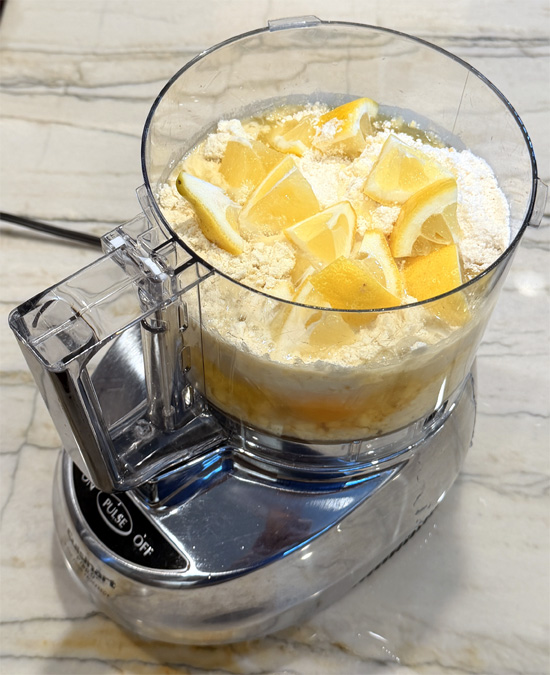 Put the cake mix, protein powder, egg whites, whole egg, avocado oil, water and lemon into a blender and mix until smooth.