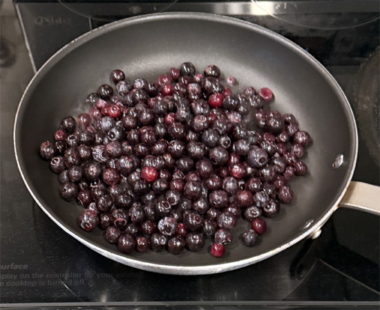 Pour the blueberries into a medium sauce pan and turn the heat on medium high.