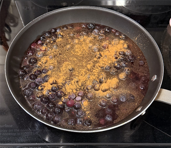 Stir the sugar/cinnamon mix into the blueberries and bring everything to a light boil. Keep stirring.