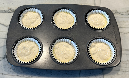 Divide the mixture between the 6 cupcake liners. Then, put them in the oven to bake for 12-15 minutes. DON'T OVERCOOK. They're done when a toothpick inserted into the center of a muffin comes out clean. 