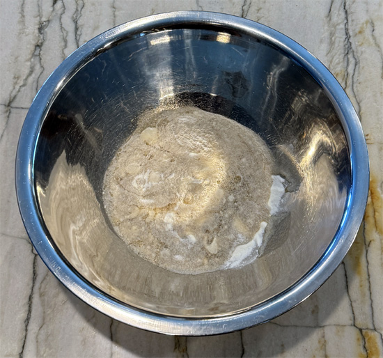 Get the cold, sugar free root beer and combine it with a packet of Dream Whip in a metal or glass bowl. Beat it with a mixer for 2-3 minutes until soft peaks form.