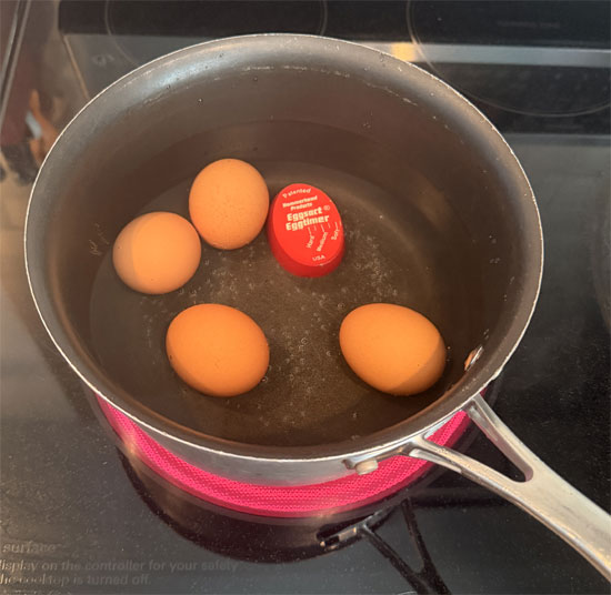 Hard boil the eggs: Place 2 large eggs in a pot with 4 cups of cold water. Bring to a boil over high heat, then remove from heat and cover. Let sit for 12–14 minutes, then transfer eggs to an ice bath for 10 minutes. Peel, chop, and set aside. 