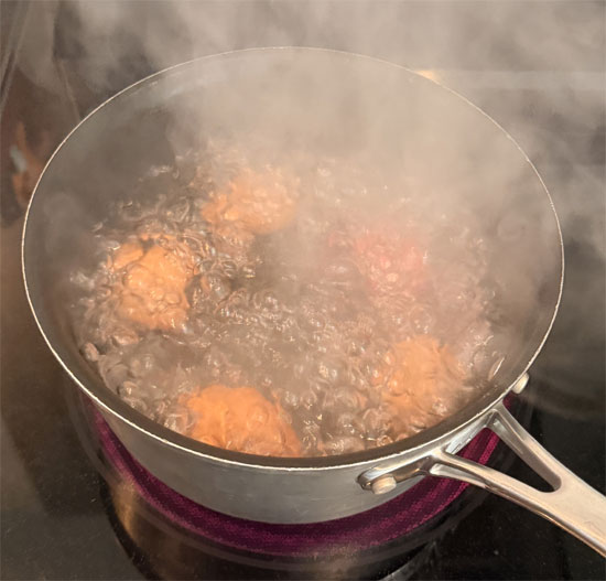 Hard boil the eggs: Place 2 large eggs in a pot with 4 cups of cold water. Bring to a boil over high heat, then remove from heat and cover. Let sit for 12–14 minutes, then transfer eggs to an ice bath for 10 minutes. Peel, chop, and set aside. 