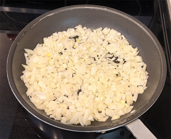 Cook the onion for 2 minutes, then add the bell peppers and cook another 2 minutes. Add the mushrooms and continue cooking until the onion is soft and translucent, about 3 more minutes.