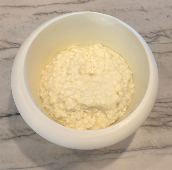 Put 3 cups fat free cottage cheese in a small bowl (if using an immersion blender) or a food processor. Add 1 box (0.3 oz) Zero Sugar Black Cherry Jell-O and 2 tablespoons lemon juice, then blend until completely smooth.