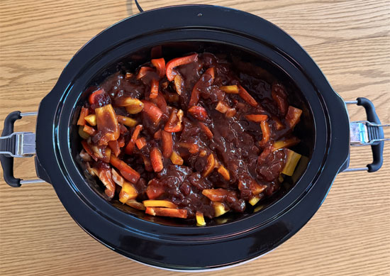 Combine cranberry sauce and BBQ sauce, then pour over chicken and vegetables.