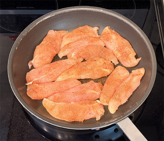 Lightly spray the pan with olive oil. Put the chicken in spice side down, then sprinkle the rest of the spice mixture over the top. Cook 5 minutes, flip, and cook 5 minutes more. The chicken is done when the middle reaches 165 degrees Fahrenheit.