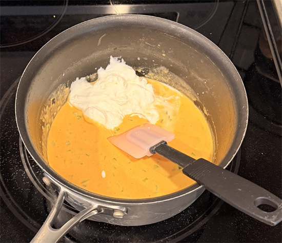 Take the pot off the heat and whisk in the yogurt. Off the heat matters here, because yogurt can separate if it gets too hot.