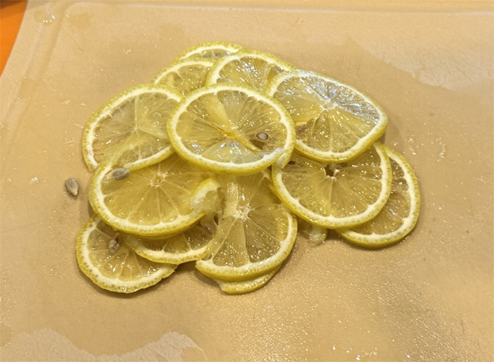 Prepare the Collard Greens: In a large bowl, toss the chopped collard greens with the cumin, sliced lemon, and lemon juice. Lightly spray with olive oil to coat.