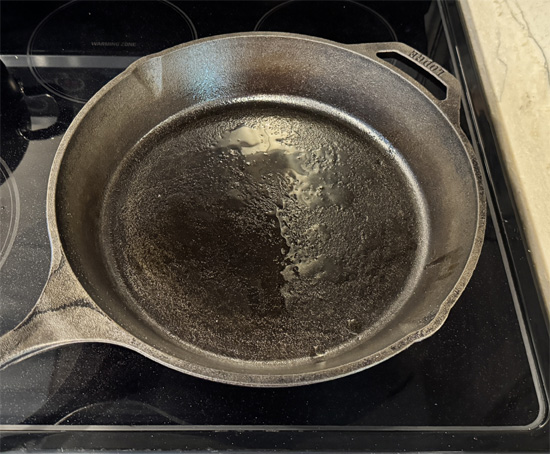 Cook the Collard Greens: Heat a large frying pan (at least 12 inches across) over medium heat. Add the collard greens to the pan, then pour the broth over them. Cook for 9-10 minutes, stirring occasionally, until the greens are tender.