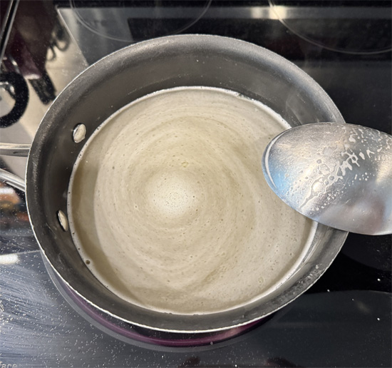 Cook quinoa: In a medium pot, bring chicken broth, 1 tsp olive oil, and 1/4 tsp salt to a boil. Add quinoa, reduce heat to low, cover, and simmer 15 minutes.