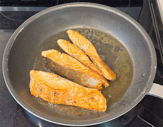 Use tongs to turn each fillet on its side and sear about 30 seconds per side.