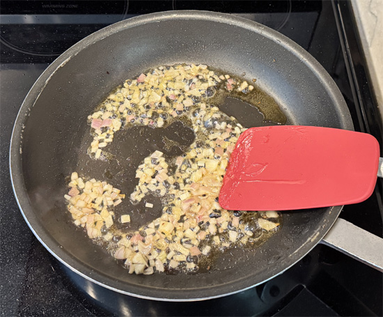 Add shallot and cook 1–2 minutes until softened.