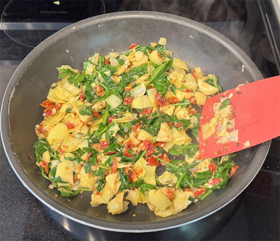 Add spinach and cook 2–3 minutes, stirring, until wilted.