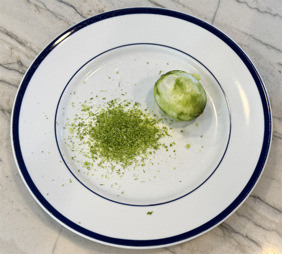 In a small bowl, whisk together chicken broth, lime juice, lime zest, olive oil, and minced garlic.