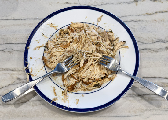 Remove chicken and shred with two forks.