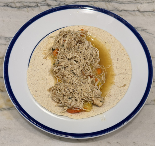 Add 1/2 cup shredded chicken