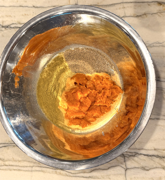 In a large bowl, combine pumpkin, half and half, sage and black pepper. Set aside.