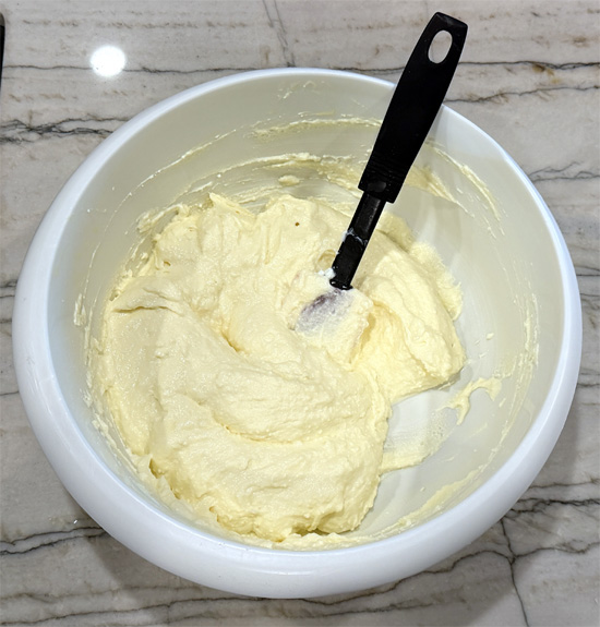 In a large bowl, mix ricotta, whole eggs, and egg whites until smooth. Set aside. 