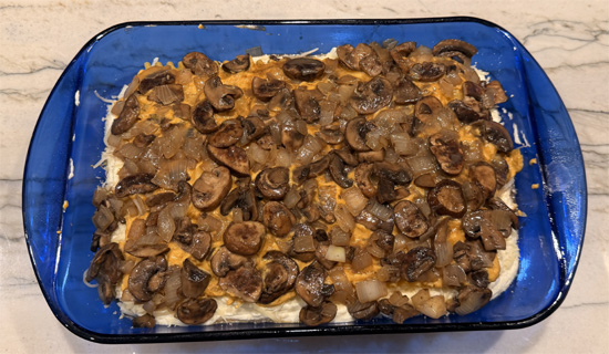 Top with remaining 3 noodles, spread with remaining pumpkin sauce, add remaining mushroom mixture, and finish with remaining cheese.