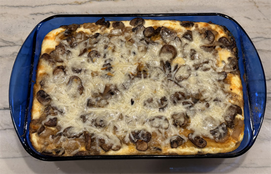 Uncover and move to upper-middle rack. Bake until cheese is golden, about 15 minutes.