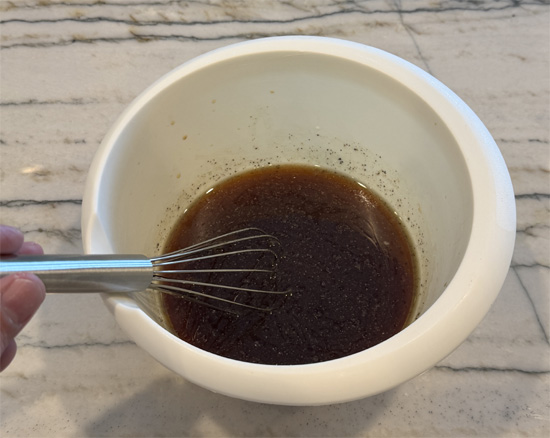 In a bowl, whisk together chicken broth, mirin, brown sugar, sesame oil, soy sauce, oyster sauce, black pepper, white pepper, and cornstarch. Set aside.