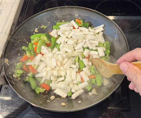 Add the bok choy. Stir and cook for another minute.