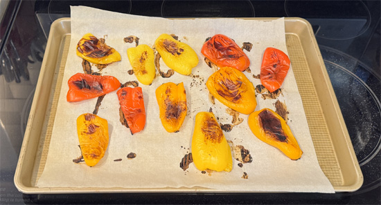 Roast the peppers: Preheat oven to 425°F. Place on parchment-lined baking sheet. Roast 25-30 minutes, turning once, until skin is charred and peppers are soft. 