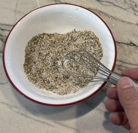 Mix seasoning: In a small bowl mix together the 8 seasoning ingredients, cornstarch, salt, black pepper, garlic powder, onion powder, oregano, basil and rosemary. Set aside. 