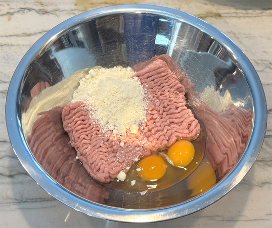 Mix the crust: In a large bowl, gently combine ground meat, eggs and cheese. Mix by hand or with a spoon until combined. 