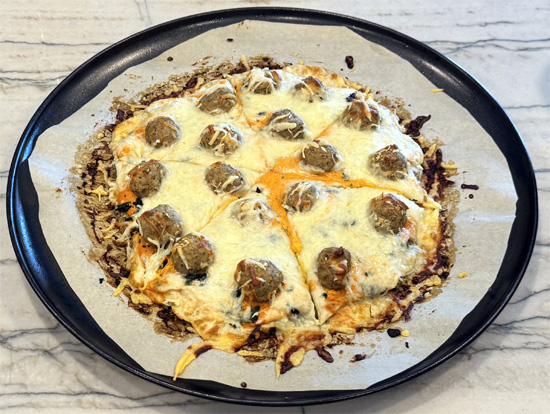 Serve: Let cool for 5 minutes before slicing. Serve with extra red pepper sauce on the side. 