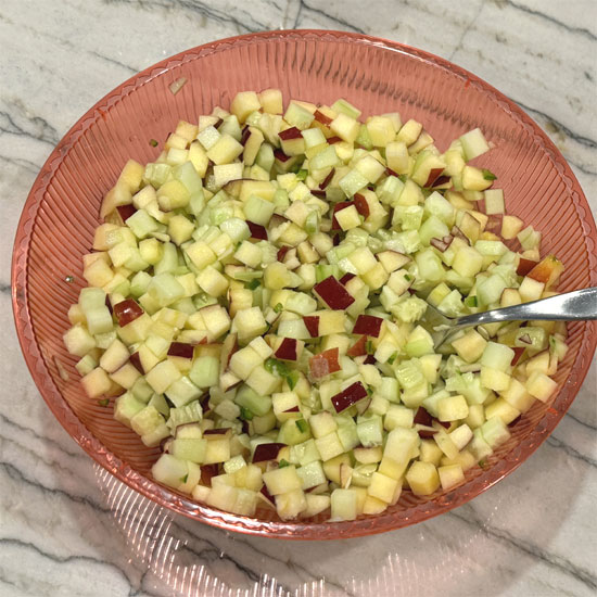Mix everything together and serve. Covering or storing it in an airtight container will keep it fresh for two days. The lime juice helps prevent the apples from turning brown.