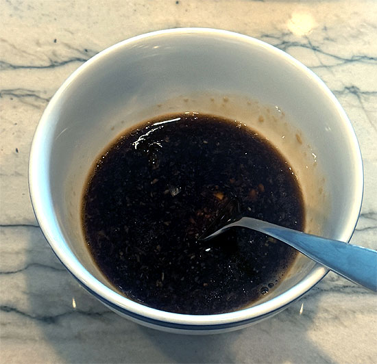 Make the dressing: In a small bowl, whisk together the rice vinegar, soy sauce, ginger paste and spicy relish.