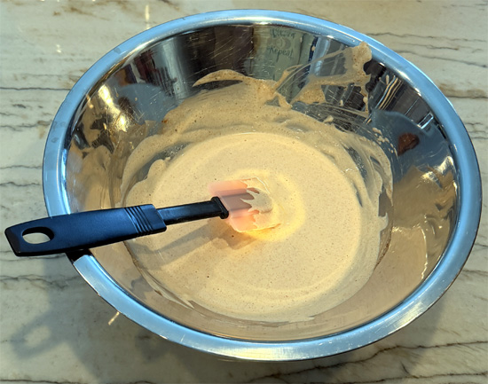 In a separate bowl, whisk together the Greek yogurt, mayonnaise, lime juice, honey, hot sauce, lemon pepper, garlic powder, paprika, and cumin until smooth.