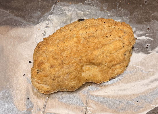 Place the chicken patty on a baking sheet and bake until cooked through and crispy, about 20 minutes.