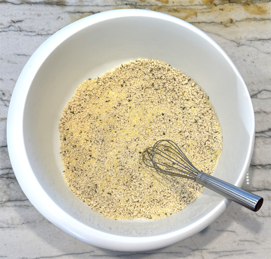In a shallow bowl, combine the coating ingredients: panko, cornmeal, flour, salt, garlic powder, and black pepper. Set aside.