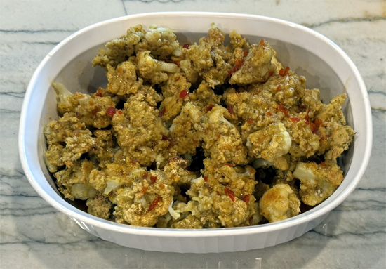 Once the cauliflower is finished, put it into a large serving dish. Drizzle the sauce over the cauliflower and gently toss to coat. Divide into six servings. You can refrigerate the leftovers for up to 3 days. 