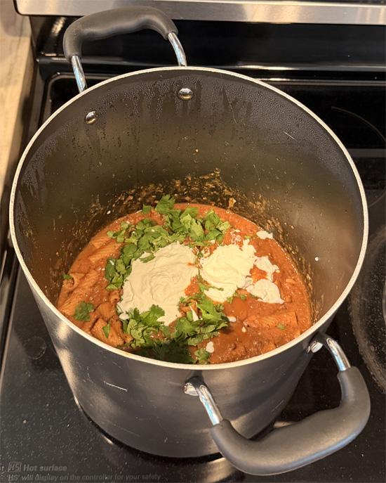 Stir in the cilantro, yogurt and parmesan. Cook an additional 2 minutes and serve. 