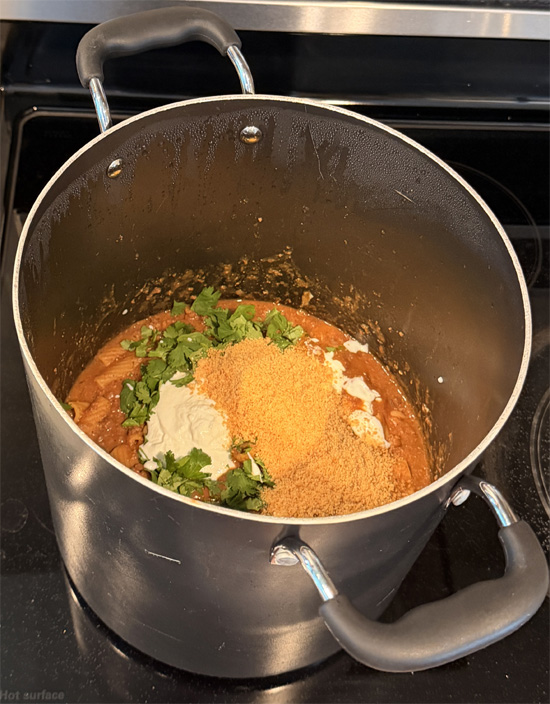 Stir in the cilantro, yogurt and parmesan. Cook an additional 2 minutes and serve. 