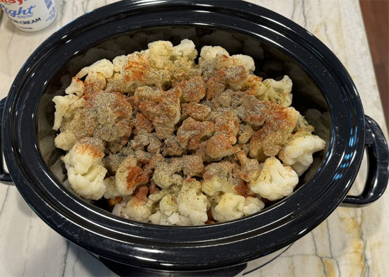 Then sprinkle all the spices over the top, Dash, celery seed, onion powder, garlic powder, paprika and thyme.